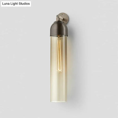 Metallic Tube Sconce Light by Decorbites with clear glass tube and Edison bulb on Tampa Home & Garden Store