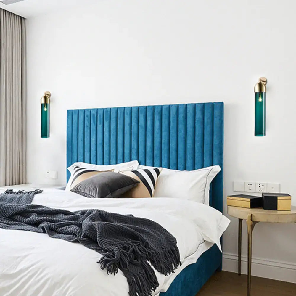 Pair of Decorbites Metallic Tube Sconce Lights in teal glass with brass caps on Tampa Home & Garden Store