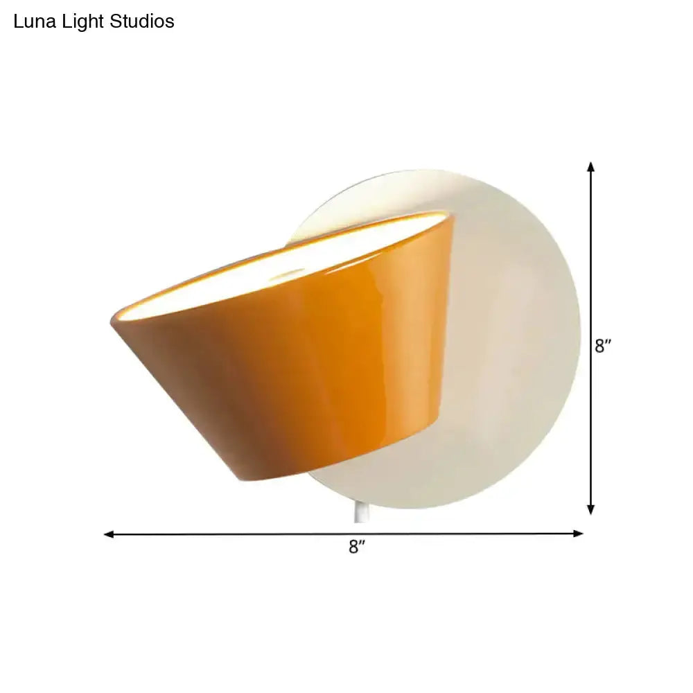 Decorbites Modernist orange metal shade wall lamp for bedroom with white circular backplate on Tampa Home & Garden Store