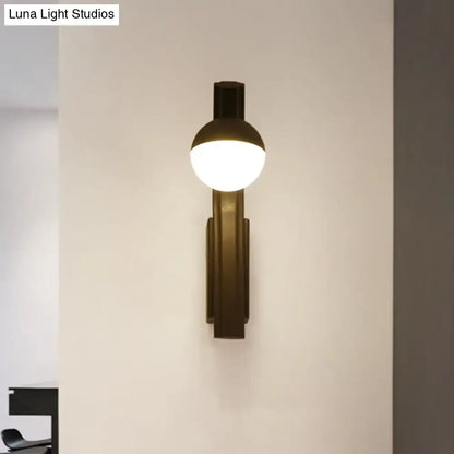 Black Glass Orb Sconce by Decorbites, matte black wall light with a glass globe on Tampa Home & Garden Store