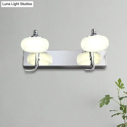 Silver frosted vanity light by Decorbites, dual globe bulbs on chrome backplate on Tampa Home & Garden Store