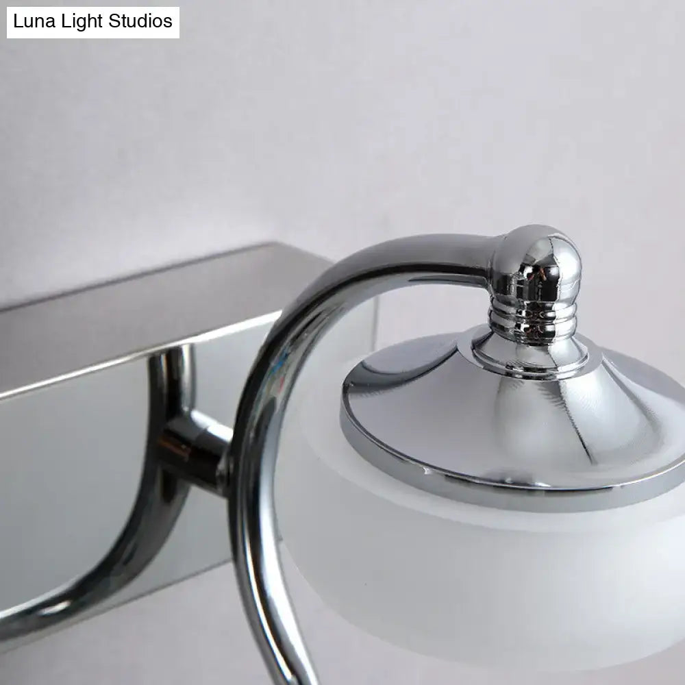 Decorbites silver frosted vanity light with chrome curved arm and frosted glass shade on Tampa Home & Garden Store