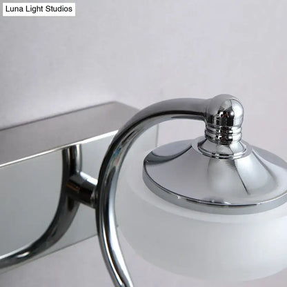 Decorbites silver frosted vanity light with chrome curved arm and frosted glass shade on Tampa Home & Garden Store