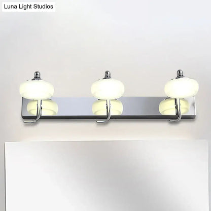 Silver Frosted Vanity Light three-light chrome bar with frosted glass globes above a mirror on Tampa Home & Garden Store