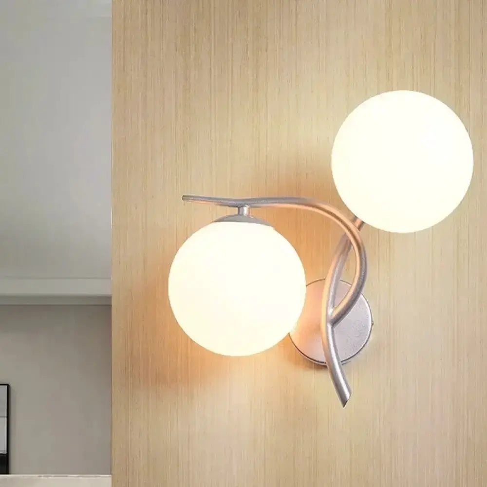 Modernist silver and black wall light with two milky glass globes for bedroom by Decorbites on Tampa Home & Garden Store