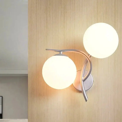 Modernist silver and black wall light with two milky glass globes for bedroom by Decorbites on Tampa Home & Garden Store