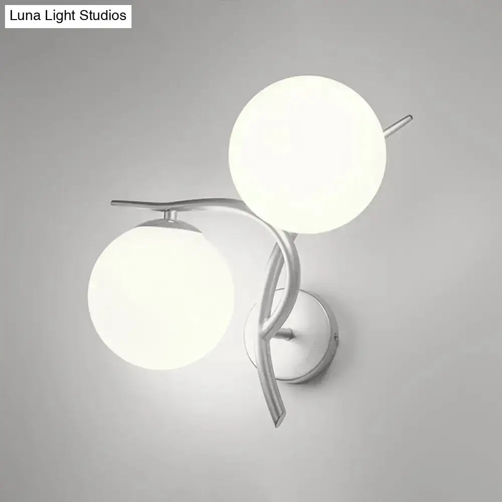 Modernist silver wall sconce with dual milky glass globes and curved arms Luna Light Studios on Tampa Home & Garden Store
