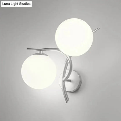 Modernist silver wall sconce with dual milky glass globes and curved arms Luna Light Studios on Tampa Home & Garden Store
