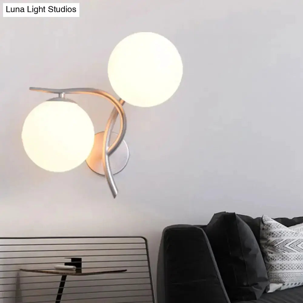 Modernist two-globe wall sconce in silver & black with milky glass by Decorbites on Tampa Home & Garden Store