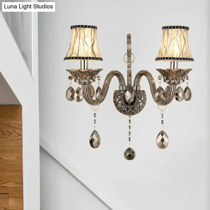 Modernist smoke grey crystal sconce by Decorbites with dual arms and teardrops on Tampa Home & Garden Store