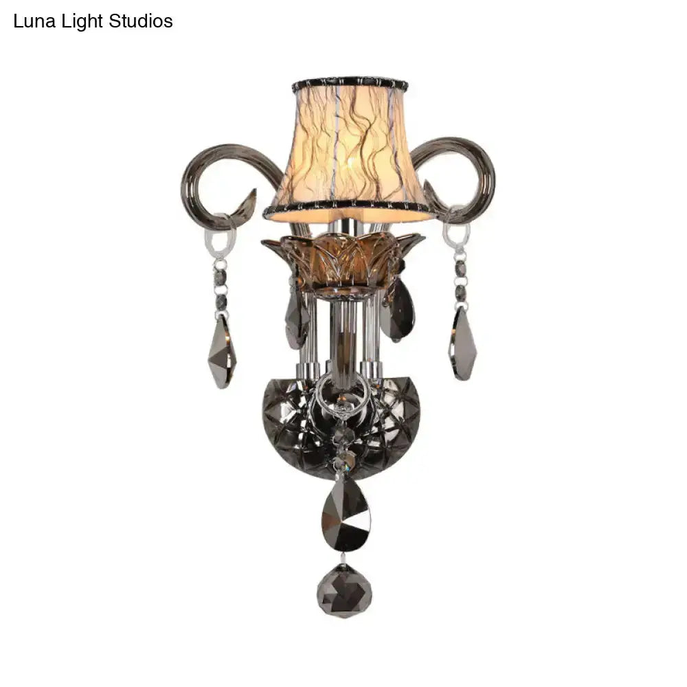 Modernist smoke grey crystal wall sconce with hanging prisms by Decorbites on Tampa Home & Garden Store