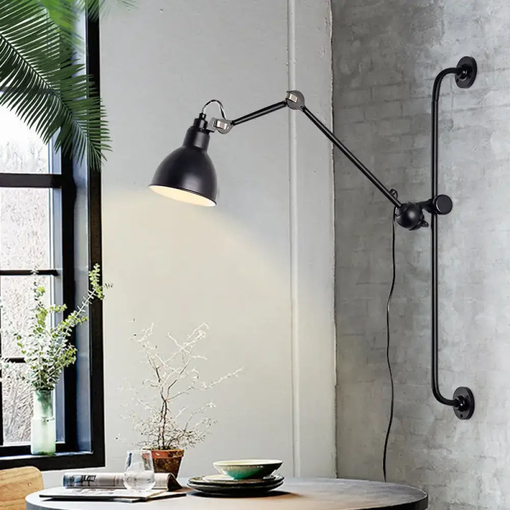 Black metal adjustable wall lamp with extendable arm and white interior shade on Tampa Home & Garden Store