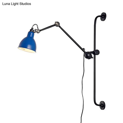 Blue shade adjustable wall lamp with articulated black metal arm and wall mount on Tampa Home & Garden Store