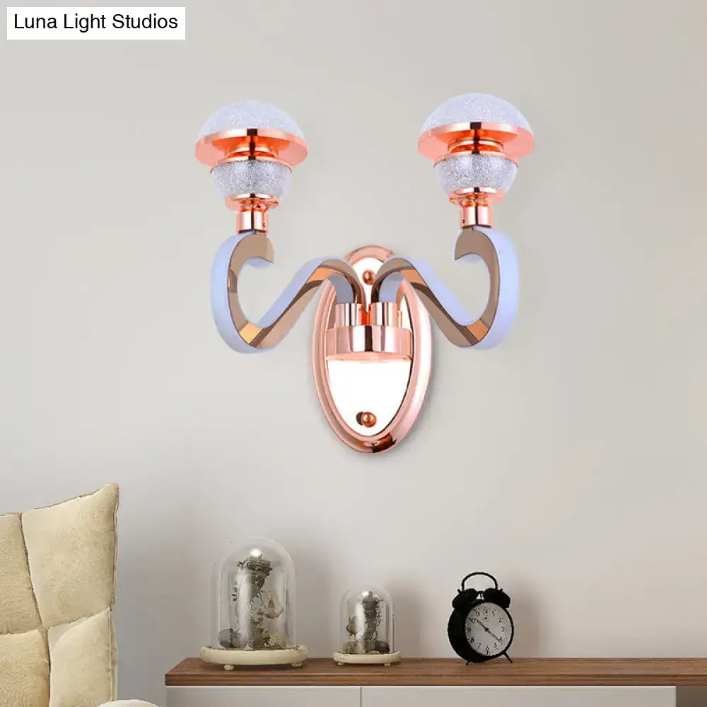 Rose Gold Urn Sconce by Decorbites with twin curved arms and frosted glass globes on wall on Tampa Home & Garden Store