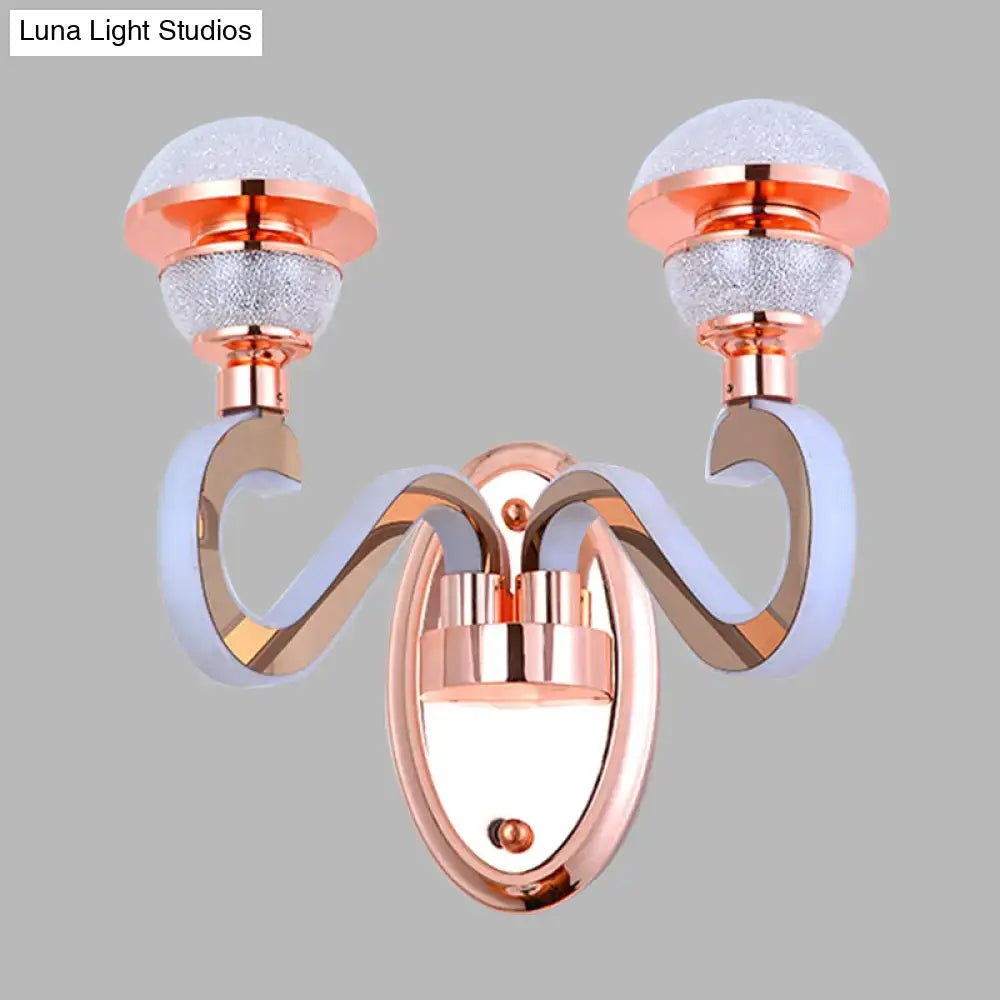 Rose Gold Urn Sconce by Decorbites with dual curved arms and frosted glass globes on Tampa Home & Garden Store