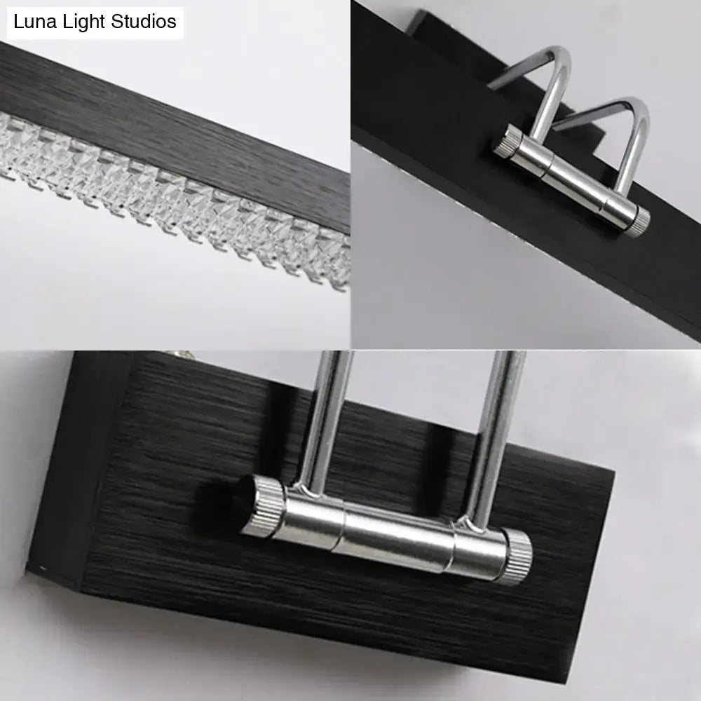 Decorbites modernist wall light with crystal LED detail on black wood block and chrome arms on Tampa Home & Garden Store