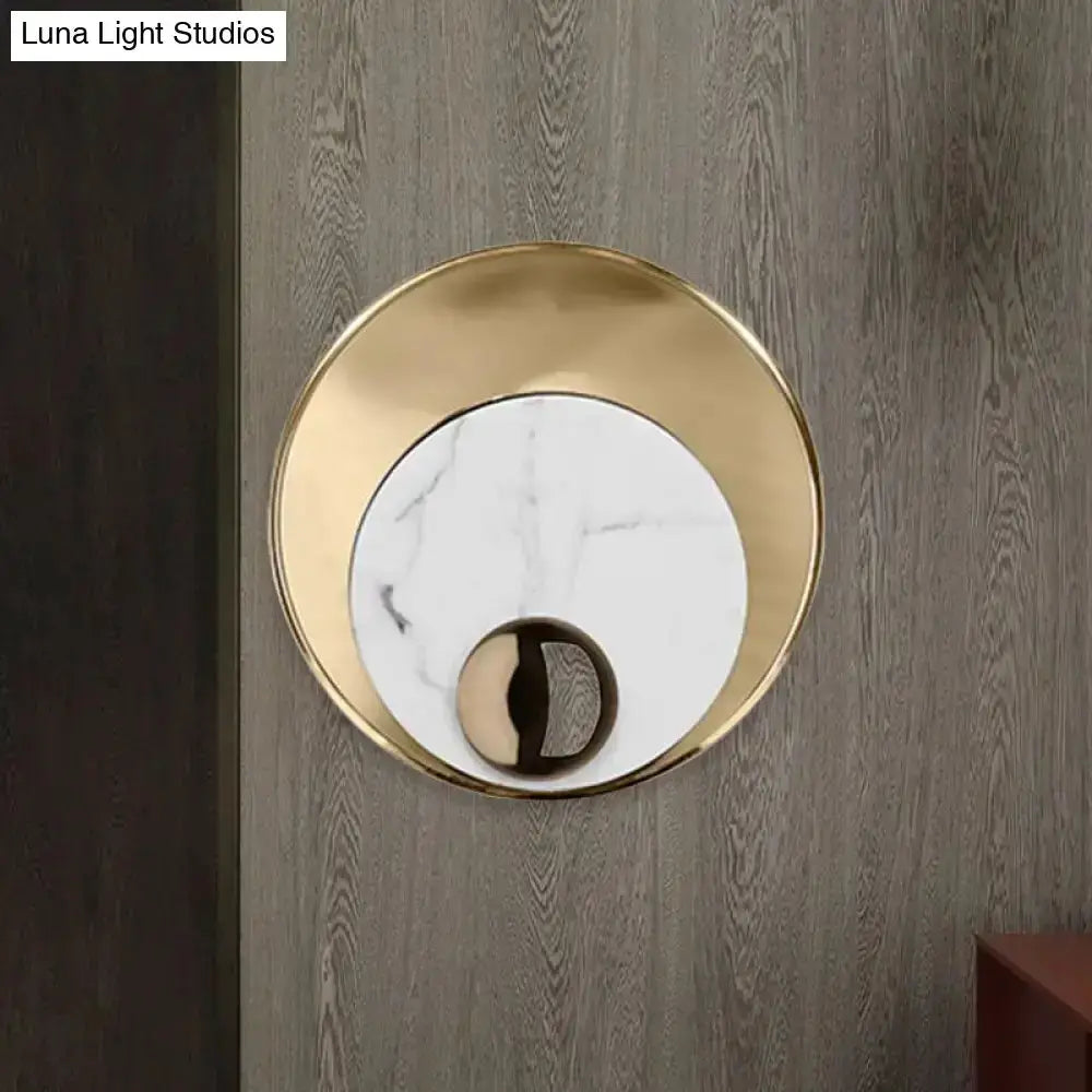 Modernist white and black LED sconce with gold circular frame wall mounted by Decorbites on Tampa Home & Garden Store