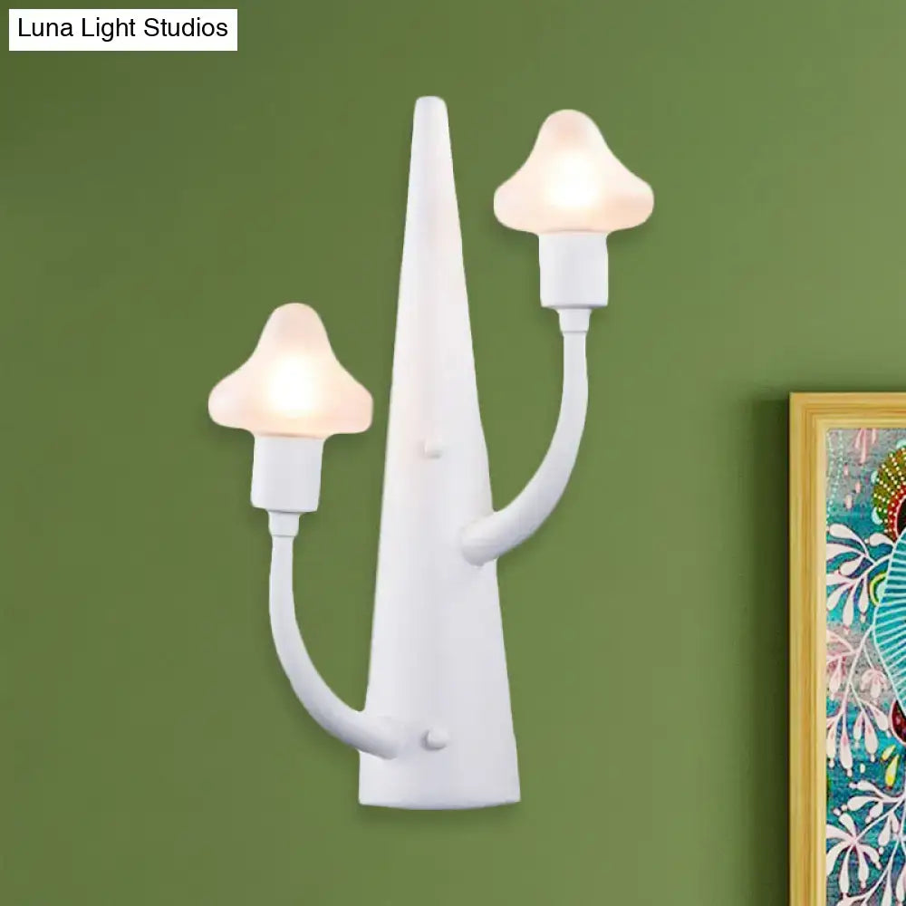 White ceramic glass sconce with dual candle arms and mushroom shades by Decorbites on Tampa Home & Garden Store