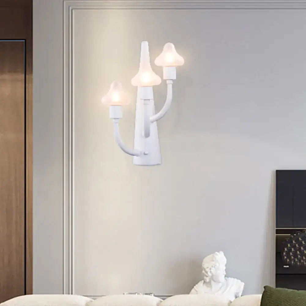 White ceramic glass sconce with three candle-style frosted glass shades, wall-mounted Decorbites on Tampa Home & Garden Store
