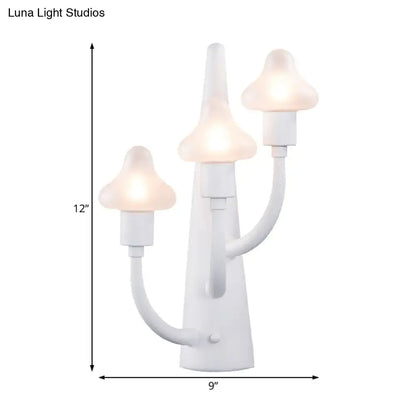 White ceramic glass sconce with three arms and mushroom-shaped glass shades by Decorbites on Tampa Home & Garden Store