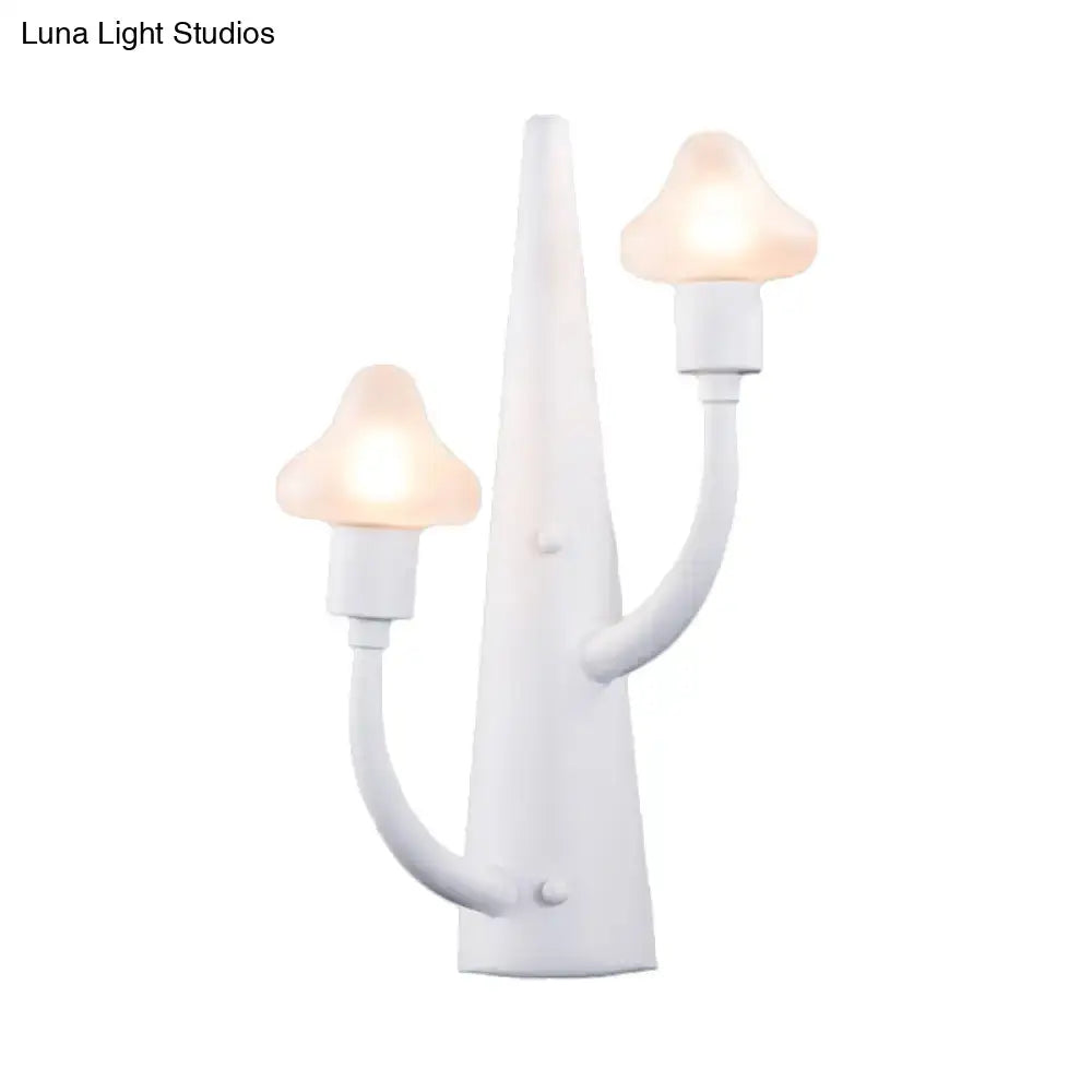 White ceramic glass sconce with dual curved arms and mushroom-shaped bulbs on Tampa Home & Garden Store