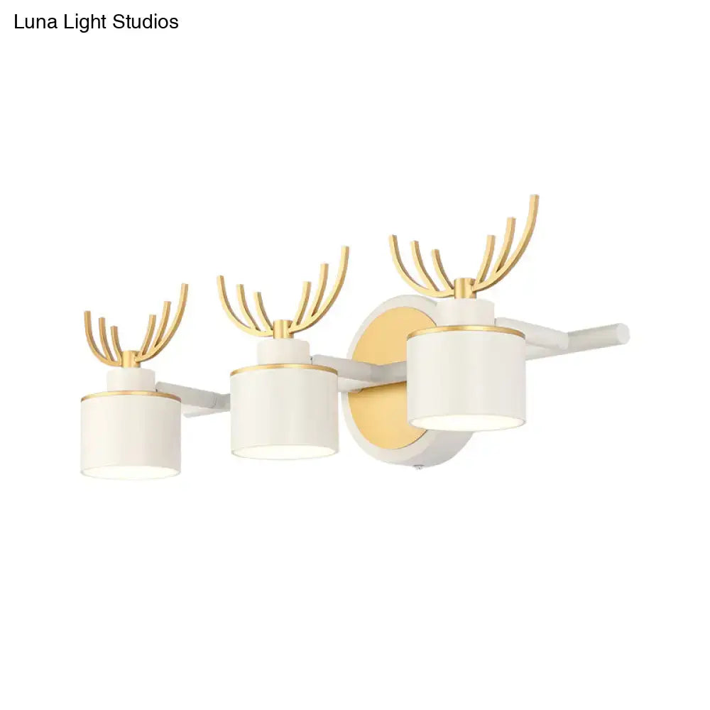 White Gold Antler Sconce with three drum shades and gold antlers on backplate Decorbites on Tampa Home & Garden Store