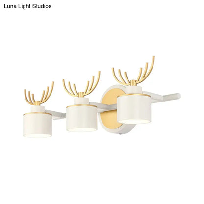 White Gold Antler Sconce with three drum shades and gold antlers on backplate Decorbites on Tampa Home & Garden Store