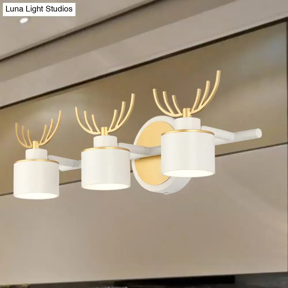 White Gold Antler Sconce with three white shades and gold antlers by Decorbites on Tampa Home & Garden Store