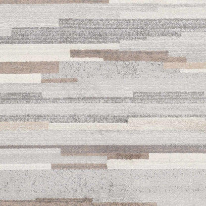 Monkland Area Rug by Boutique Rugs, neutral abstract patchwork in ivory, beige, and gray on Tampa Home & Garden Store