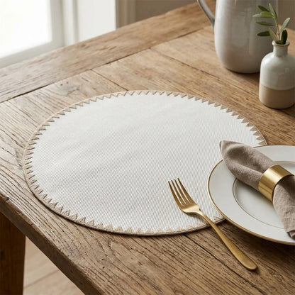 Montana Placemat With Bold Geometric Trim, light beige woven texture on a rustic wood table on Tampa Home & Garden Store