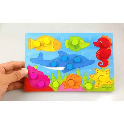 Montessori wooden beaded clock puzzle for children with 7 sea creatures on blue board on Tampa Home & Garden Store