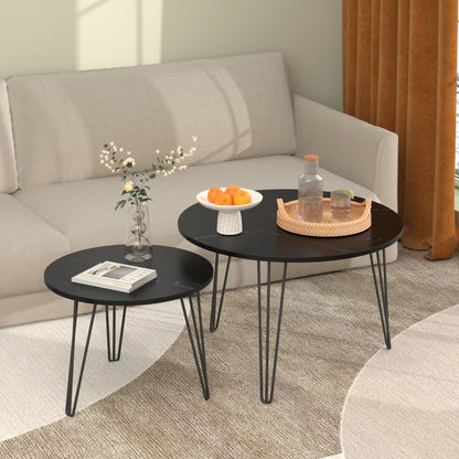 Nesting coffee tables set of 2 with black metal frames and round black tops on Tampa Home & Garden Store