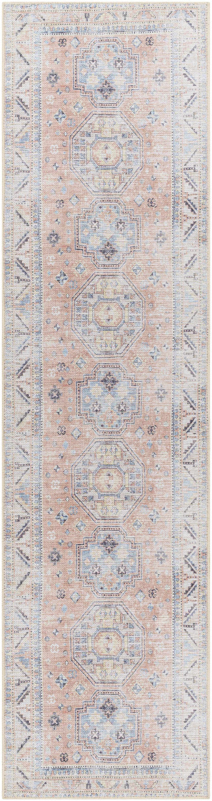 Morcott Peach Washable Area Rug by Boutique Rugs, peach runner with blue geometric medallions on Tampa Home & Garden Store