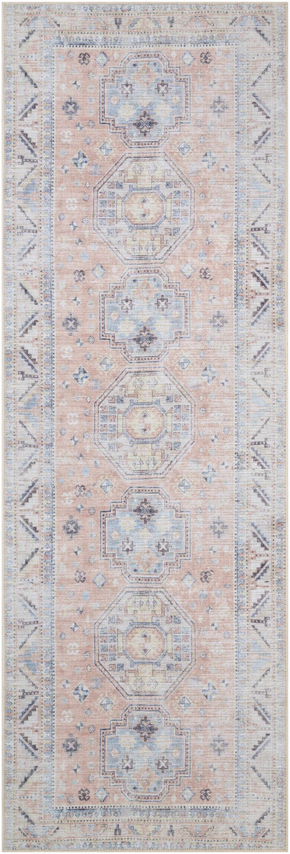 Morcott Peach Washable Area Rug by Boutique Rugs with pale blue medallion motifs in peach on Tampa Home & Garden Store
