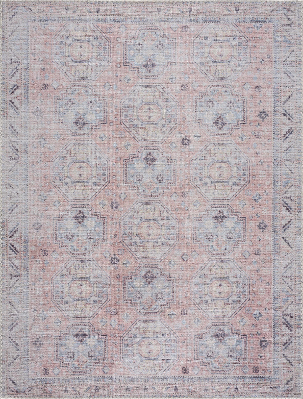 Morcott Peach Washable Area Rug in peach and blue with geometric medallions by Boutique Rugs on Tampa Home & Garden Store
