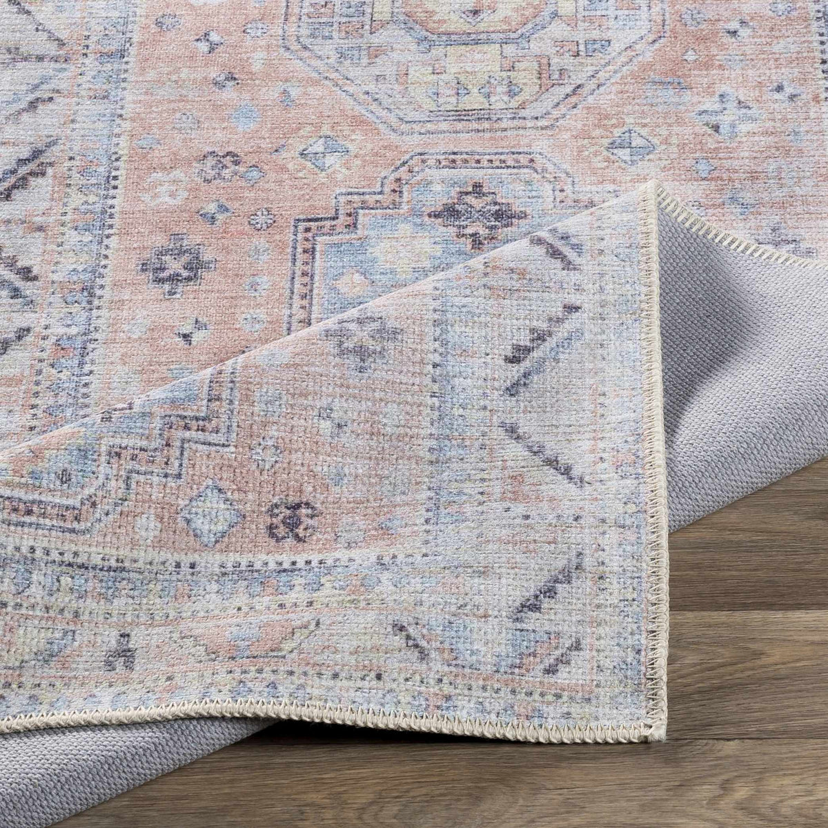 Morcott Peach washable area rug with peach and blue oriental motifs, Boutique Rugs on Tampa Home & Garden Store