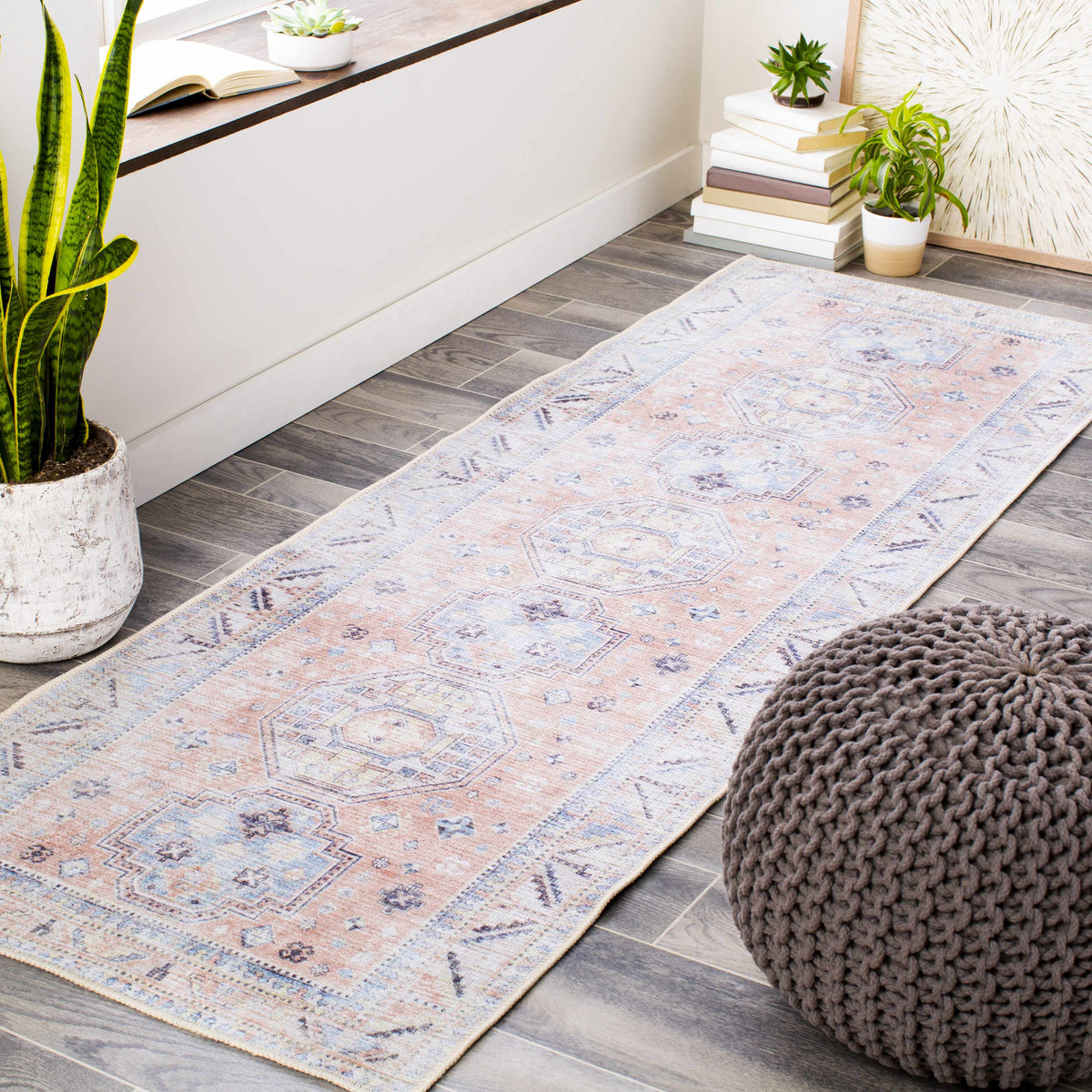 Rug Morcott Peach Washable Area Rug by Boutique Rugs in peach and blue geometric pattern on Tampa Home & Garden Store