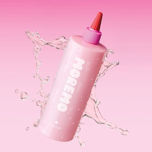 Pink plastic hair treatment bottle moremo Water Treatment Miracle 10 with red cap and splash on Tampa Home & Garden Store