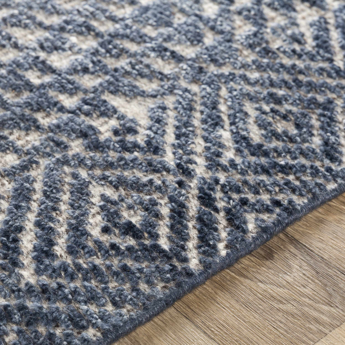 Moyne Area Rug by Boutique Rugs in blue gray ivory textured pile on Tampa Home & Garden Store