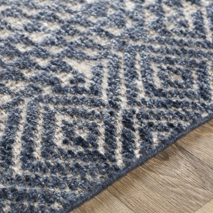 Moyne Area Rug by Boutique Rugs in blue gray ivory textured pile on Tampa Home & Garden Store