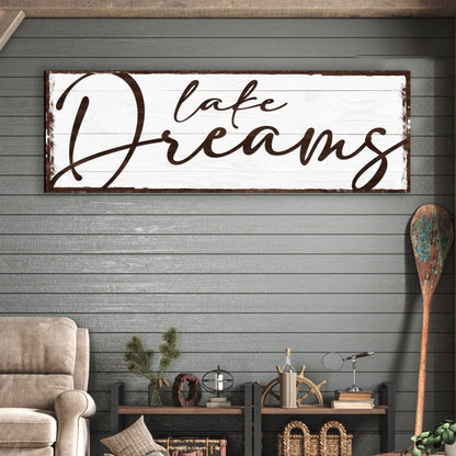 Lake Dreams canvas sign by Tailored Canvases, white wooden panel with brown cursive lettering on Tampa Home & Garden Store