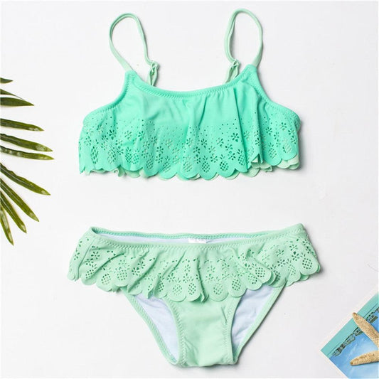 Mint green girls two-piece bikini set with scalloped eyelet floral edges and straps on Tampa Home & Garden Store