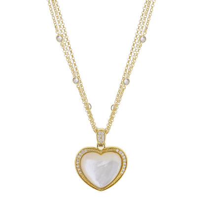 Pave Love Necklace gold-tone heart pendant with pavé diamonds and mother-of-pearl center on chain on Tampa Home & Garden Store