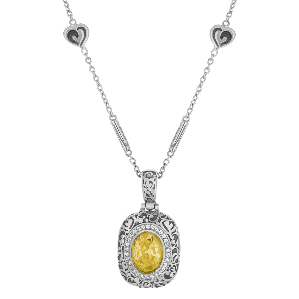 Hidden Hearts pendant by Lauren G Adams; silver setting with yellow gemstone on heart-link chain on Tampa Home & Garden Store