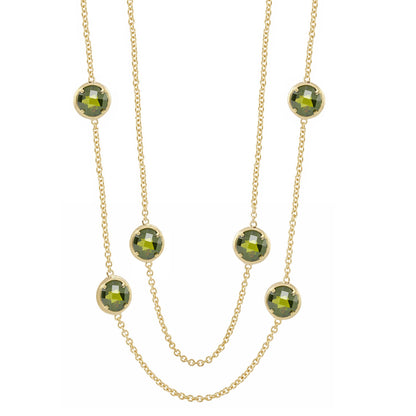Glamour by the Yard Necklace by Lauren G Adams with green faceted stones in gold-tone bezels on delicate gold chains on Tampa Home & Garden Store