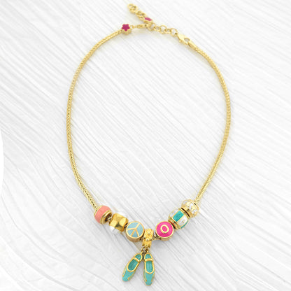 Gabriella Beads Necklace with gold-tone chain, turquoise beads and slipper charms on Tampa Home & Garden Store