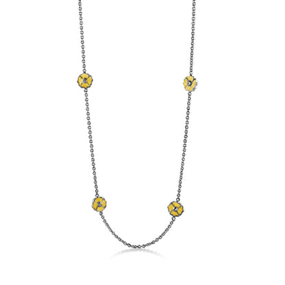 Poppy Love Long Necklace by Lauren G Adams with yellow poppy charms on a silver chain on Tampa Home & Garden Store