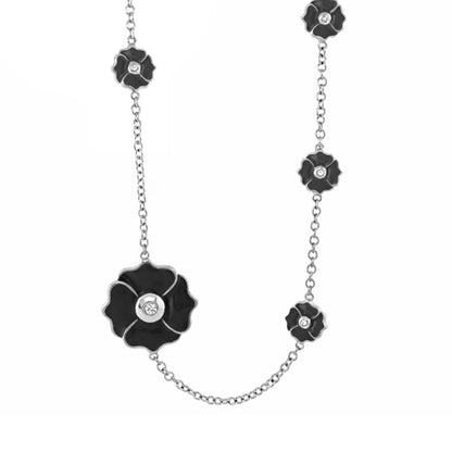 Poppy Love long necklace by Lauren G Adams with black enamel poppy charms on a silver chain on Tampa Home & Garden Store