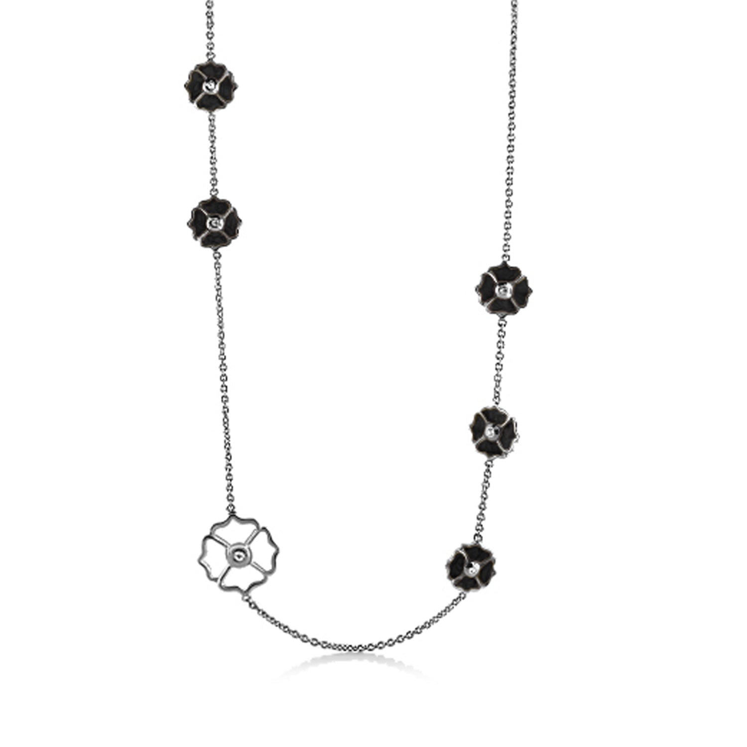 Poppy Love Long Necklace with black flower charms on a silver chain and a white floral pendant on Tampa Home & Garden Store