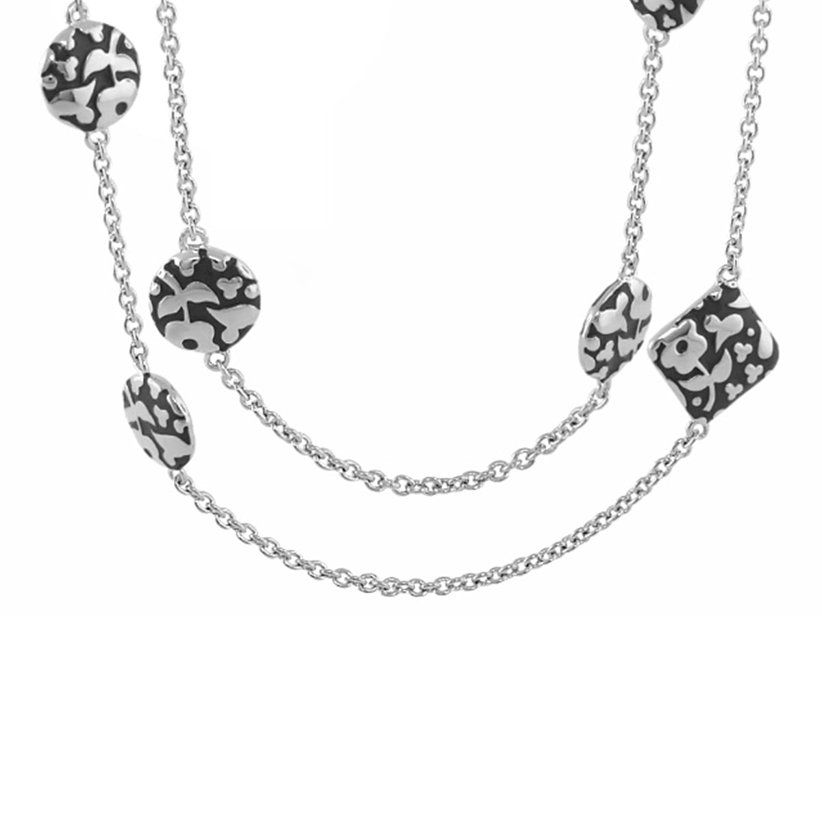 Flowers by Orly long necklace with black white floral discs on silver chain on Tampa Home & Garden Store
